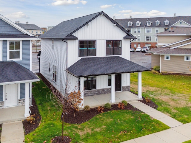 view of front of home with a front yard