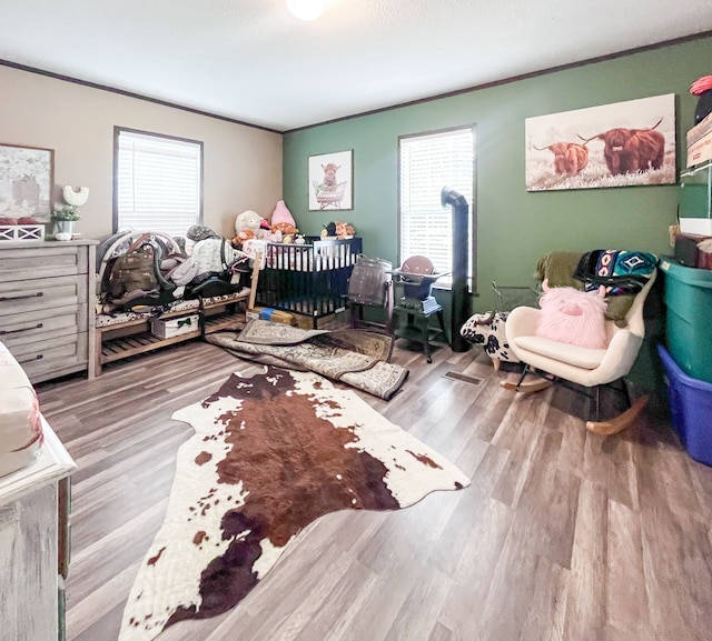 bedroom featuring light wood-type flooring