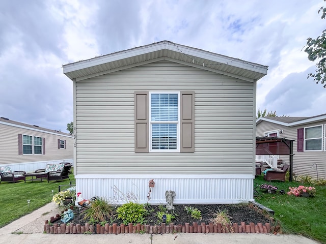 view of property exterior featuring a yard