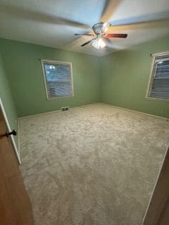 14257 Warwick St, Detroit, MI 48223 - unfurnished bedroom featuring carpet floors and ceiling fan