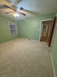 14257 Warwick St, Detroit, MI 48223 - unfurnished bedroom with carpet flooring, baseboards, and ceiling fan