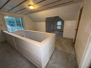14257 Warwick St, Detroit, MI 48223 - full bath featuring lofted ceiling and a garden tub