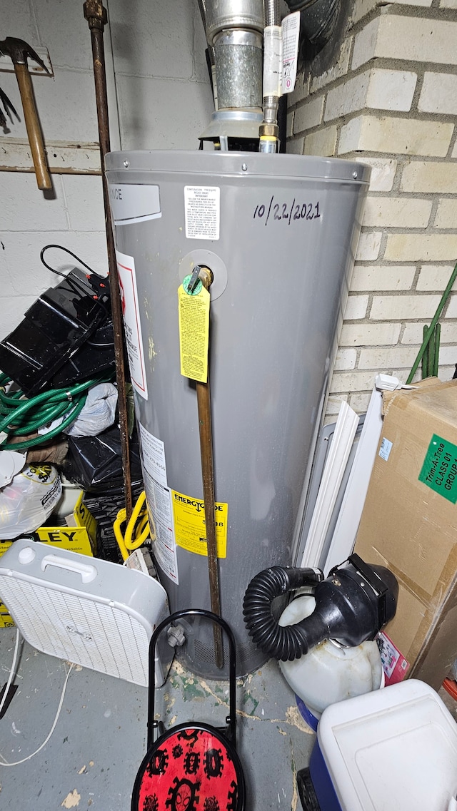 5817 Winthrop Blvd, Flint, MI 48505 - utility room featuring water heater