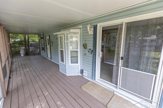 978 Timberlynn Trl, Sanford, MI 48657 - view of wooden porch