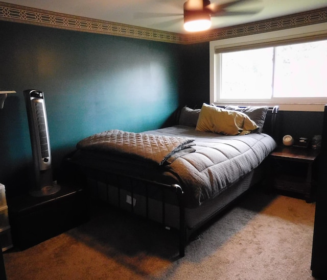 bedroom featuring carpet flooring and ceiling fan