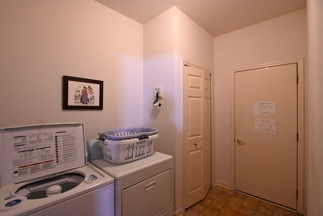 laundry room featuring washer and clothes dryer