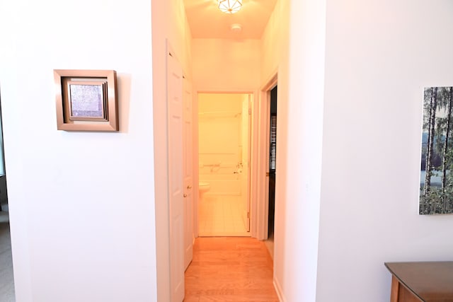 hall with light wood-type flooring