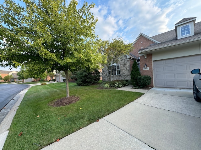 view of property exterior featuring a lawn and a garage