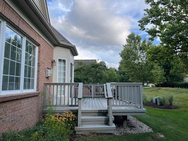 deck featuring a lawn