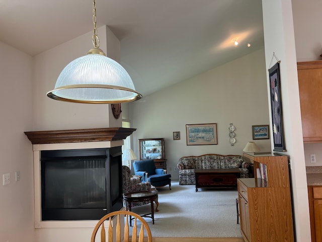 living room featuring carpet floors and high vaulted ceiling