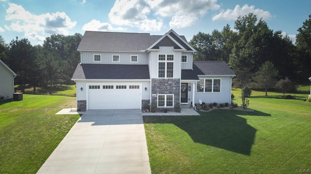 view of front of house with a garage and a front yard