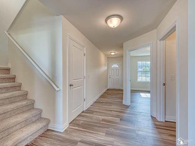 entrance foyer with hardwood / wood-style floors