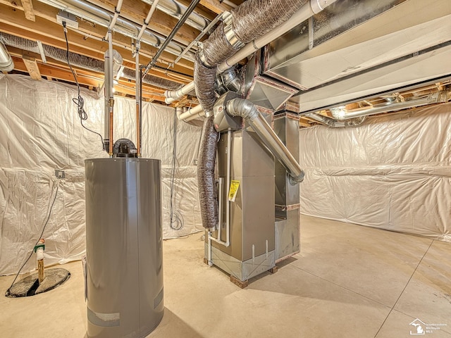 basement featuring heating unit and water heater