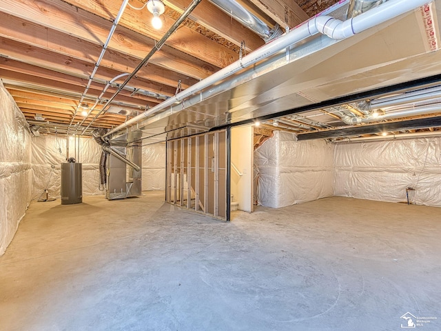 basement with heating unit and gas water heater