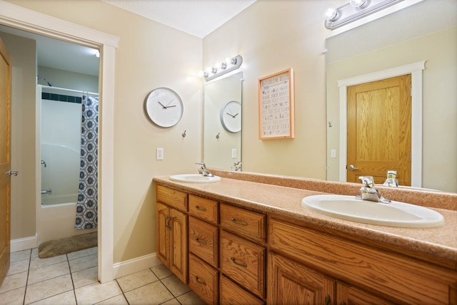 full bathroom with double vanity, tile patterned flooring, a sink, and shower / tub combo with curtain