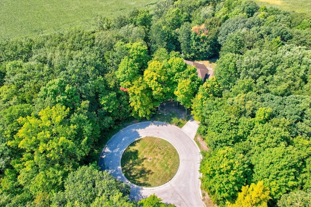 drone / aerial view with a view of trees