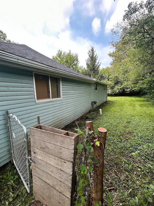 view of home's exterior featuring a yard