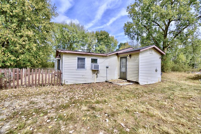 1401 S Miner Rd, Crystal, MI 48818 - back of property with cooling unit