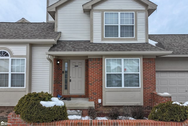 entrance to property with a garage