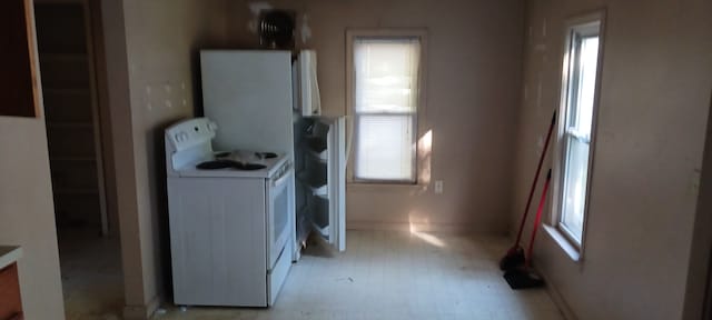 clothes washing area with a wealth of natural light