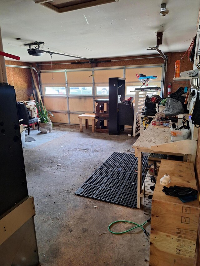 1722 N Benson Rd, Fountain, MI 49410 - garage featuring a garage door opener