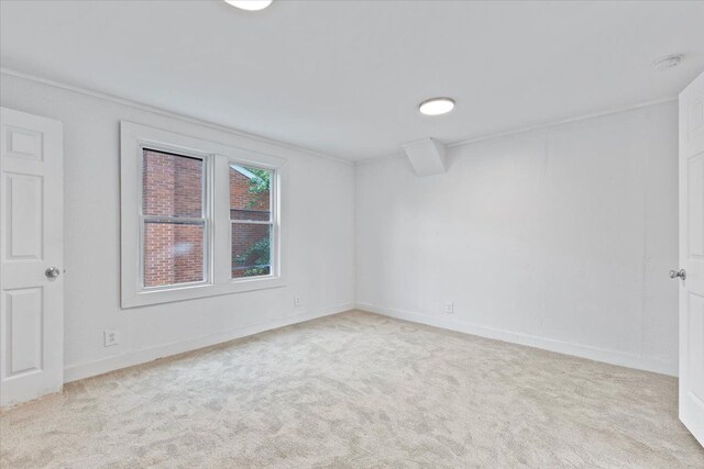 12048 Longview St, Detroit, MI 48213 - carpeted spare room featuring baseboards and ornamental molding