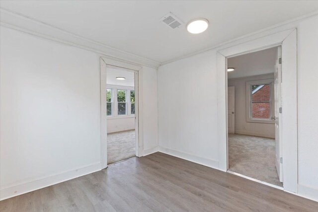 12048 Longview St, Detroit, MI 48213 - empty room featuring wood finished floors, baseboards, and ornamental molding