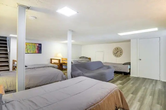 bedroom with light wood-type flooring