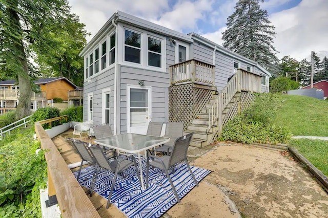 rear view of house featuring a patio