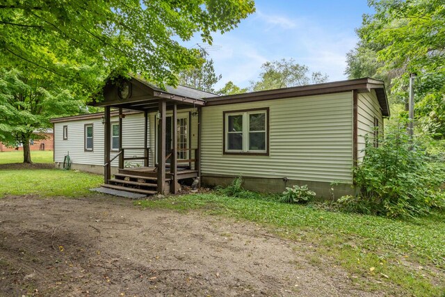 15070 Rapids Dr, Hersey, MI 49639 - manufactured / mobile home featuring crawl space and a front yard