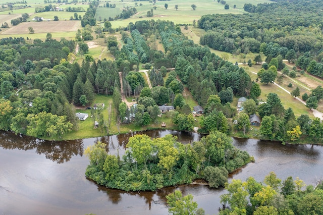 aerial view with a rural view and a water view