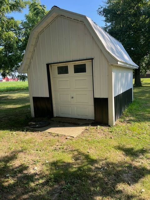 garage with a lawn