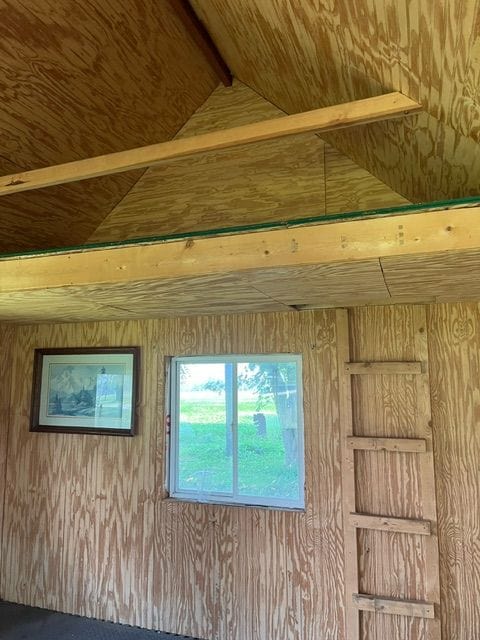 interior details featuring wood walls