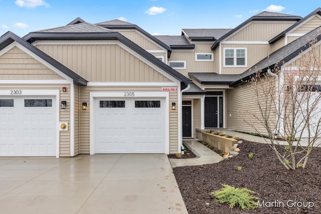 view of front of home with a garage