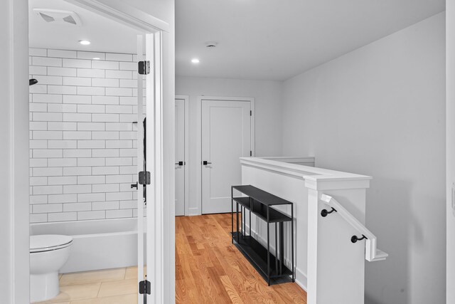 2251 Trillium Ln, Ann Arbor, MI 48104 - full bath featuring toilet, shower / tub combination, recessed lighting, and wood finished floors