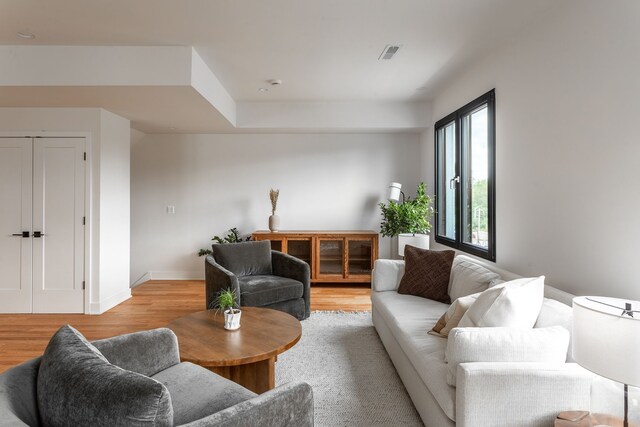 2251 Trillium Ln, Ann Arbor, MI 48104 - living area featuring light wood-style flooring and baseboards