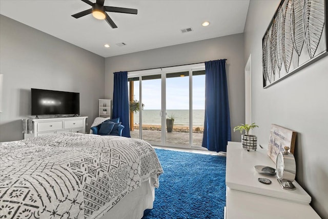 carpeted bedroom featuring ceiling fan and access to exterior