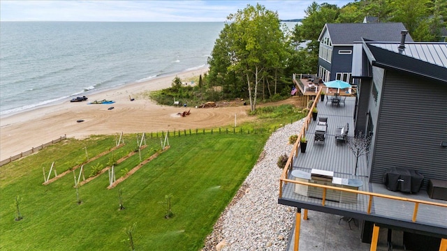 aerial view with a beach view and a water view