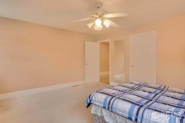 bedroom featuring ceiling fan and carpet floors