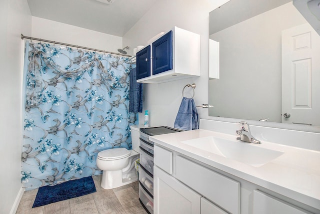 full bathroom with vanity, wood-type flooring, shower / tub combo, and toilet