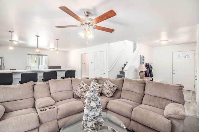 living room with ceiling fan