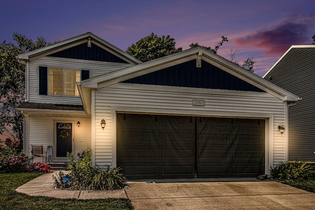 view of front of home with a garage