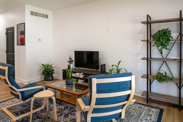 living room with hardwood / wood-style flooring