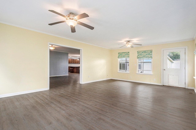 unfurnished living room with dark hardwood / wood-style floors, ceiling fan, and crown molding