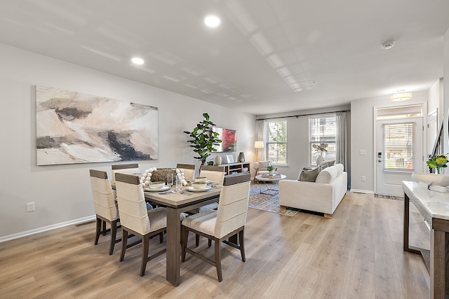 dining room featuring light wood-type flooring