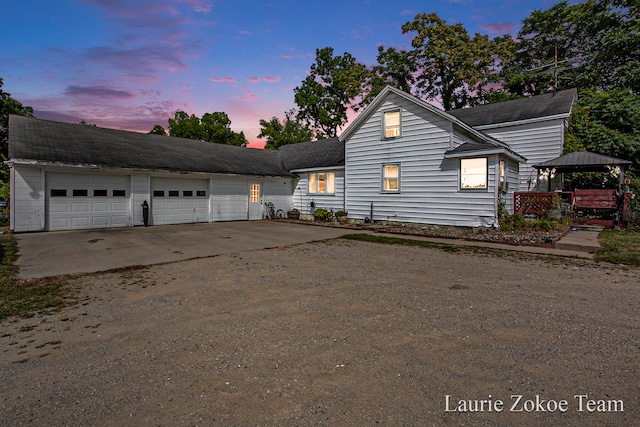 view of front property with a gazebo and a garage