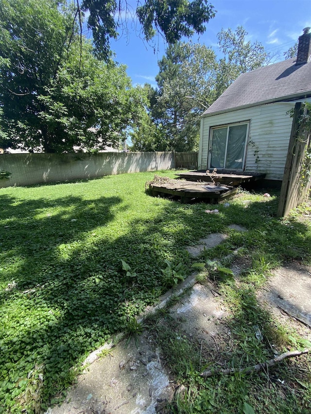 1028 Campbell St, Flint, MI 48507 - view of yard with a wooden deck