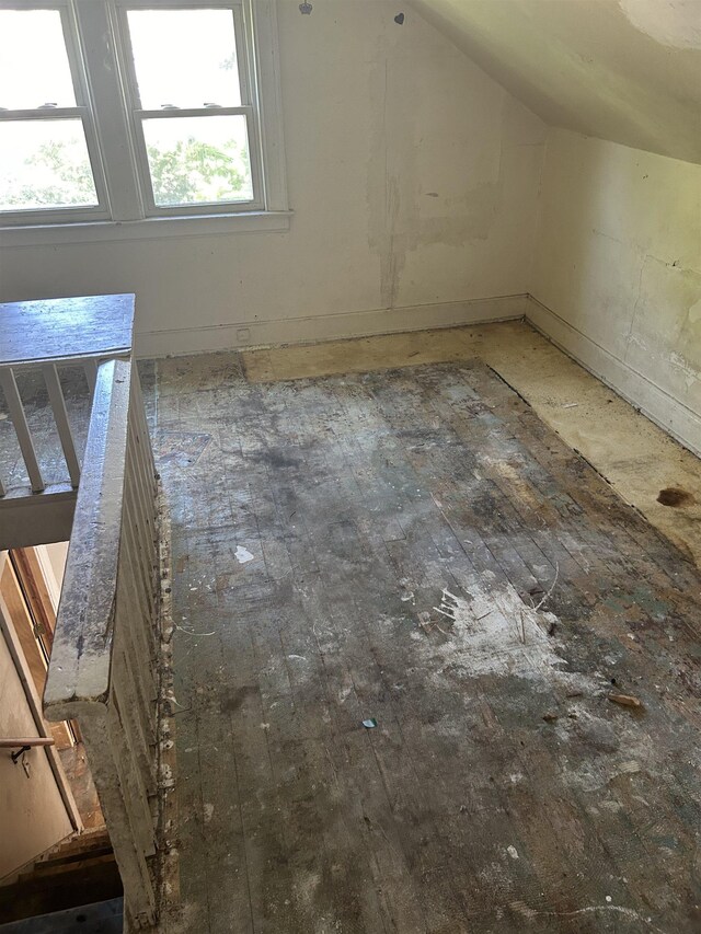 1028 Campbell St, Flint, MI 48507 - additional living space featuring vaulted ceiling and healthy amount of natural light