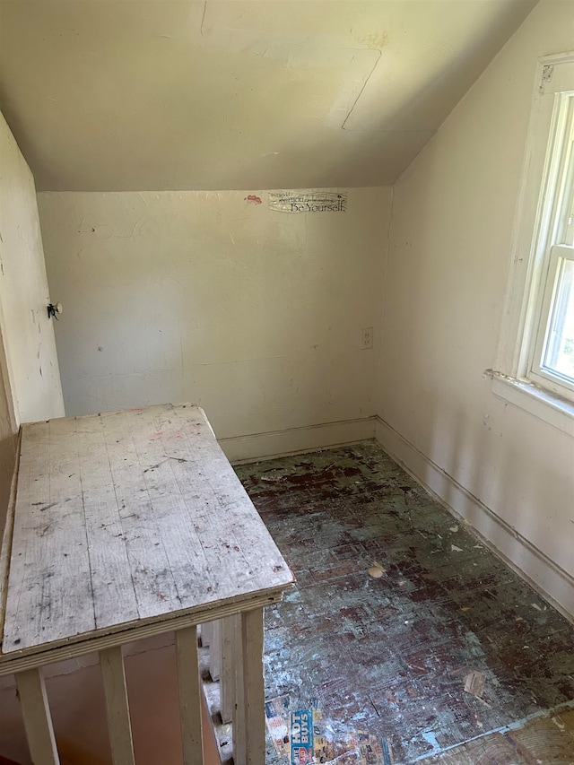 interior space featuring vaulted ceiling