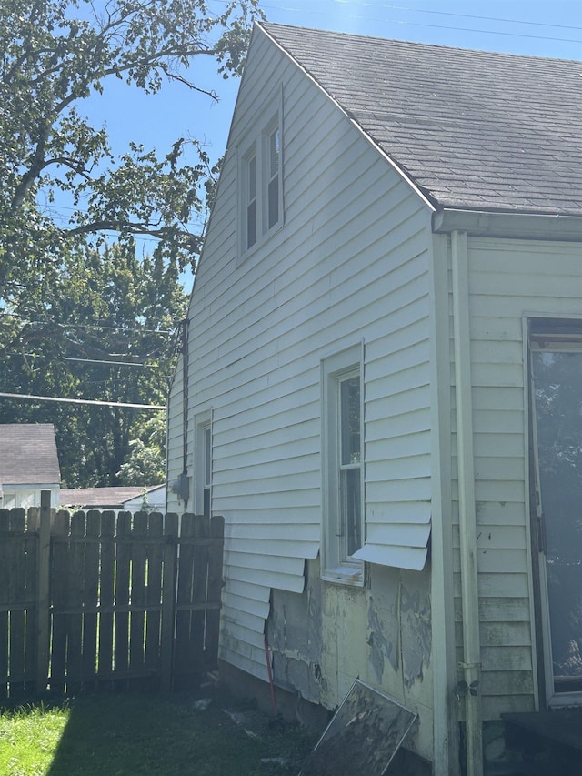 1028 Campbell St, Flint, MI 48507 - view of property exterior featuring roof with shingles